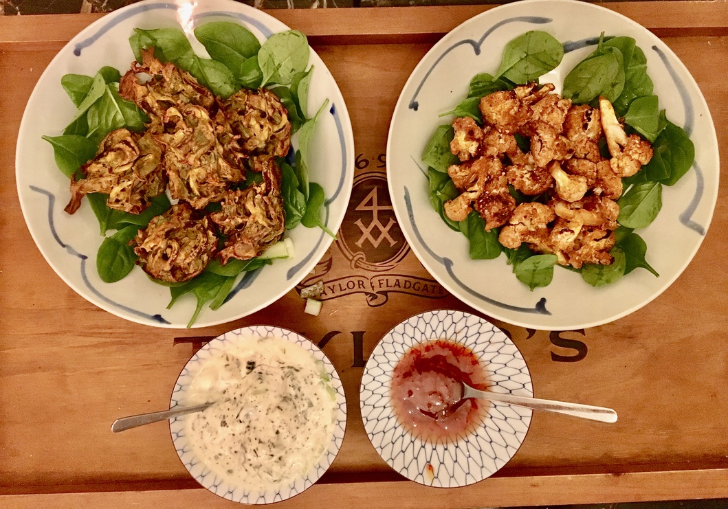 Baked onion bhajis and crispy cauliflower wings served with sweet chilli and herby garlic dips.